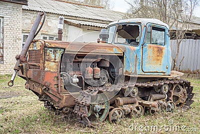 NIZNY NOVGOROD - MARCH 3: old rusty vintage abandoned tractor Editorial Stock Photo