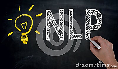 NLP is written by hand on blackboard Stock Photo