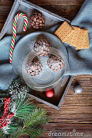 No bake chocolate Christmas pine cone sprinkled with powdered sugar Stock Photo