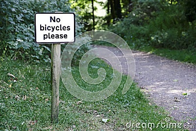 No bicycles or cyclists please sign in rural countryside private public path uk Stock Photo