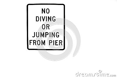 No diving or jumping from pier sign Stock Photo