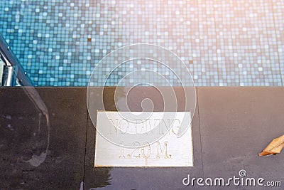 No Diving sign and pool depth Stock Photo