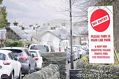 No entry for parking restricted area for cars and vehicles in conservation village of Luss at Loch Lomond to keep zone beautiful a Stock Photo