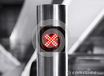 No entry sign cross digital light on stainless pole Stock Photo