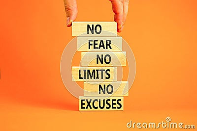 No fear limits excuses symbol. Concept words No fear no limits no excuses on wooden blocks. Beautiful orange background. Stock Photo