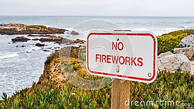 No Fireworks sign posted on the Pacific Ocean coastline, California Stock Photo