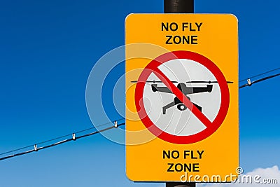No fly zone sign. No drone zone sign the blue sky background. Stock Photo