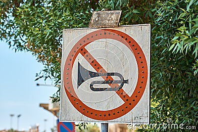 No horn sign in the city street. No honk and no noise for car Stock Photo