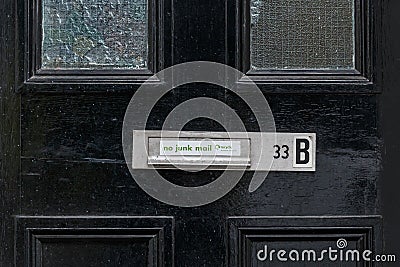 No junk mail precaution on door, London Editorial Stock Photo
