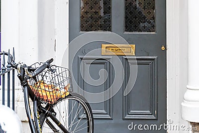 No junk mail precaution on door, London Editorial Stock Photo