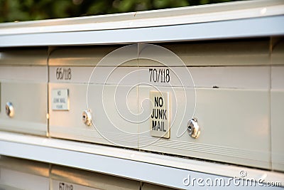 No Junk mail sign on letter boxes . Direct mailers opt out. How to stop junk mail catalogs Editorial Stock Photo