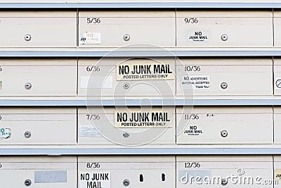 No Junk mail sign on letter boxes . Direct mailers opt out. How to stop junk mail catalogs Editorial Stock Photo