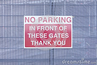 No parking in front of gates sign Stock Photo