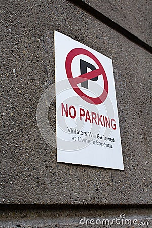 No Parking - Violators will be towed at owner`s Expense Stock Photo