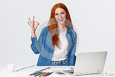 No problem, everything excellent. Confident creative redhead woman have plan, prepare design project, working with team Stock Photo