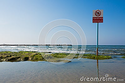 No swimming warning sign, Hebrew, Arabic, English, Tel Aviv Isreal Stock Photo