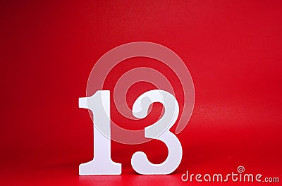 No. 13 thirteen Isolated red Background with Copy Space - Lucky or unlucky Number 13% Percentage or Promotion - Discount or a Stock Photo