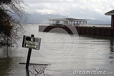 No trespassing sign in flood waters Stock Photo