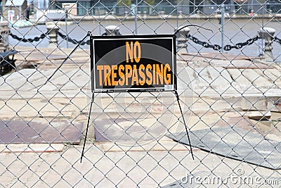 Cleveland, Ohio May 17, 2020 No Trespassing sign posted to link fence to caution no entry, danger. Editorial Stock Photo