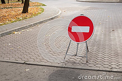 No way forward. Stop sign. Red brick sign prohibiting passage. The concept of the need to abandon plans for the future Stock Photo