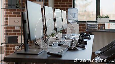 Nobody in empty call center workstation with computers Stock Photo