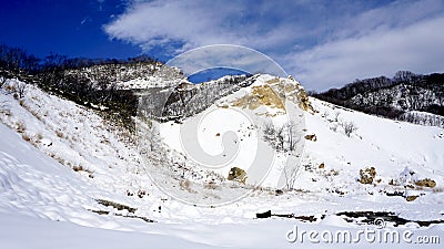 Noboribetsu onsen snow mountain bluesky hell valley Stock Photo