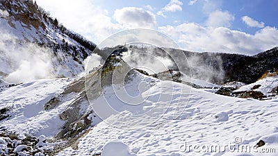 Noboribetsu onsen snow mountain and the mist winter Stock Photo