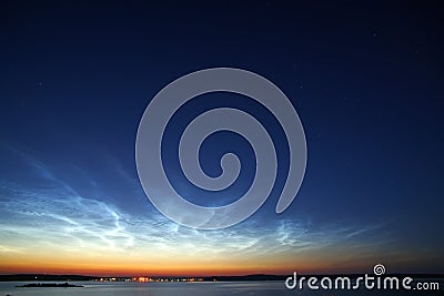 Star sky with noctilucent clouds Stock Photo