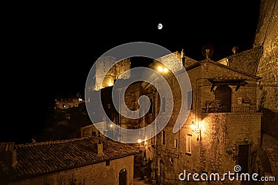 Nocturnal Enchantment: Sorano's Timeless Beauty under the Stars Stock Photo