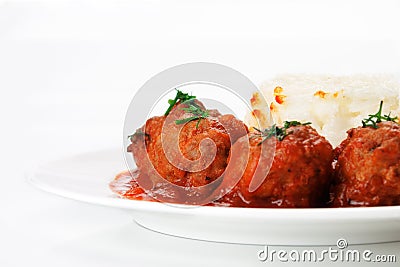 Noisettes with rice garnish Stock Photo