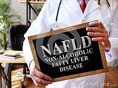 Non-alcoholic fatty liver disease NAFLD the doctor is holding a sign. Stock Photo