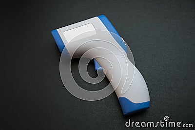 Non-contact IR body thermometer. Stock Photo