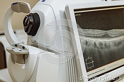 Non-contact optical coherence tomograph for visualization of the anterior and posterior segments of the eyeball. Medical equipment Stock Photo