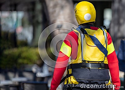 Nonprofit Organization Volunteer, full equipment, rear view. First Aid, Emergency Medic Assistance Stock Photo
