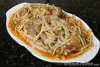 Noodles with pork ribs andalusian and spanish cuisine Stock Photo
