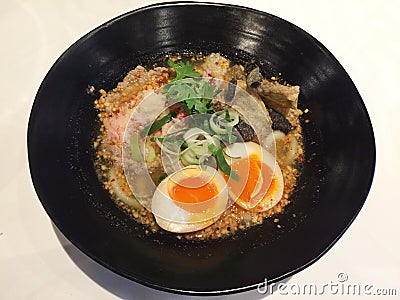 Noodles spicy soup with egg Stock Photo