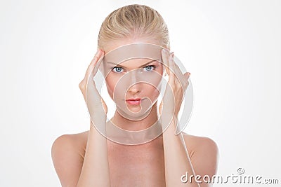 Nordic beauty massaging her head Stock Photo