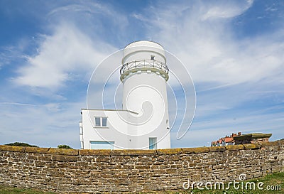 Norfolk coastline, lighthouse and blue skies Stock Photo