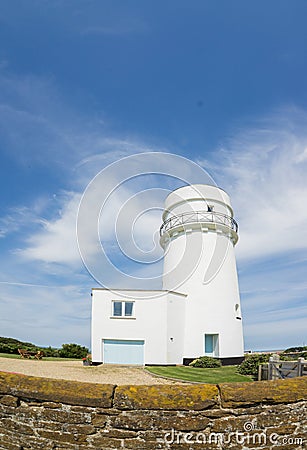 Norfolk coastline, lighthouse and blue skies Stock Photo