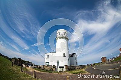 Norfolk coastline, lighthouse and blue skies Editorial Stock Photo