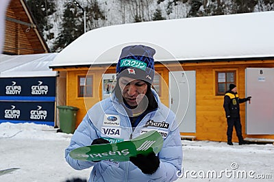 Noriaki Kasai - a world-famous ski jumping sportsman from Japan giving autographs in Wisla, Poland before FIS worldcup ski jumping Editorial Stock Photo