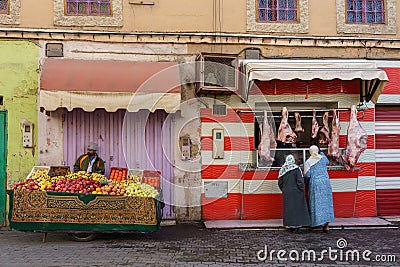 Morocco. Taroudant. A butcher's shop and fruits seller Editorial Stock Photo