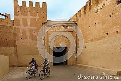 Morocco. Taroudant. Two women on bicycles in the medina Editorial Stock Photo