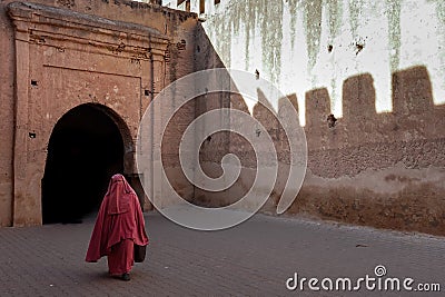 Morocco. Taroudant. A woman in a chador in the medina Editorial Stock Photo