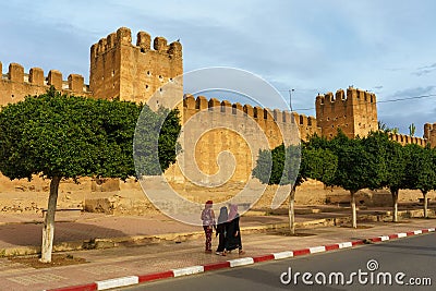 Morocco. Taroudant. Women walking front of the city walls Editorial Stock Photo