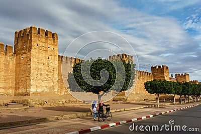 Morocco. Taroudant. Women walking front of the city walls Editorial Stock Photo