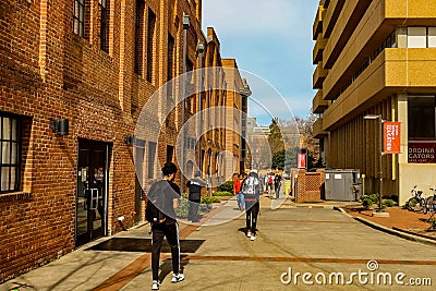 At North Carolina State University Students Walk Between Classes. Editorial Stock Photo