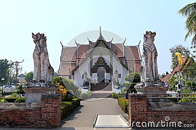 North entrance of Wat Phumin, Nan and statues of guardian lions Editorial Stock Photo