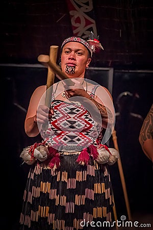 NORTH ISLAND, NEW ZEALAND- MAY 17, 2017: Close up of a Tamaki Maori woman with traditionally tatooed face and wearing Editorial Stock Photo