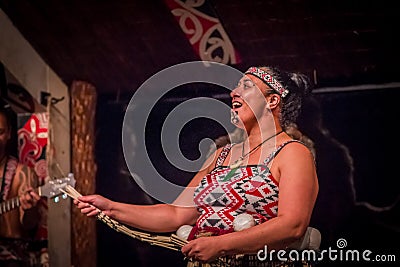 NORTH ISLAND, NEW ZEALAND- MAY 17, 2017: Close up of a Tamaki Maori woman with traditionally tatooed face and wearing Editorial Stock Photo